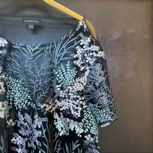 Sheer embroidered top.